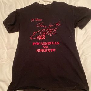 Brand is gildan size medium color is black and pink